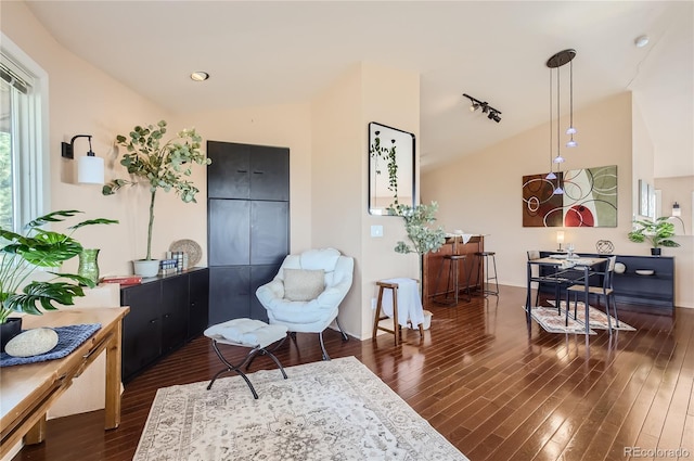 3001 Eagle Ridge Rd, Longmont, CO 80503 - sitting room with dark wood finished floors and lofted ceiling