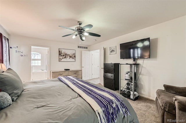 20000 Mitchell Pl Unit 51, Denver, CO 80249 - carpeted bedroom featuring baseboards, ensuite bath, and a ceiling fan
