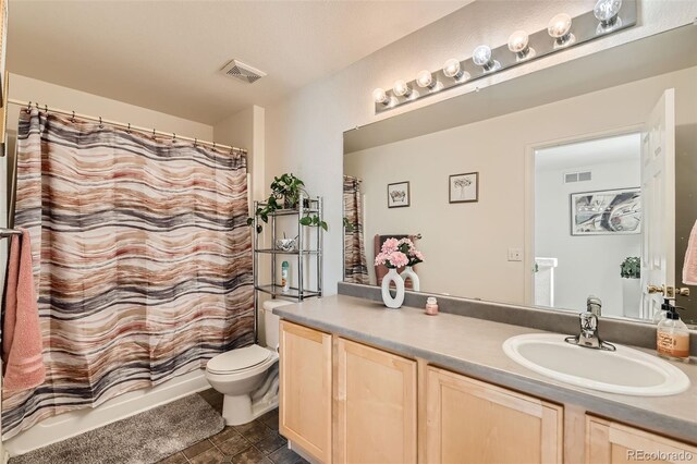 20000 Mitchell Pl Unit 51, Denver, CO 80249 - full bathroom with vanity and toilet