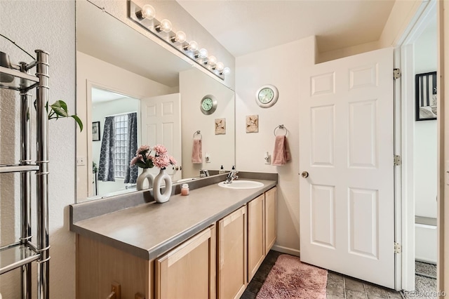 20000 Mitchell Pl Unit 51, Denver, CO 80249 - bathroom featuring vanity and tile patterned flooring