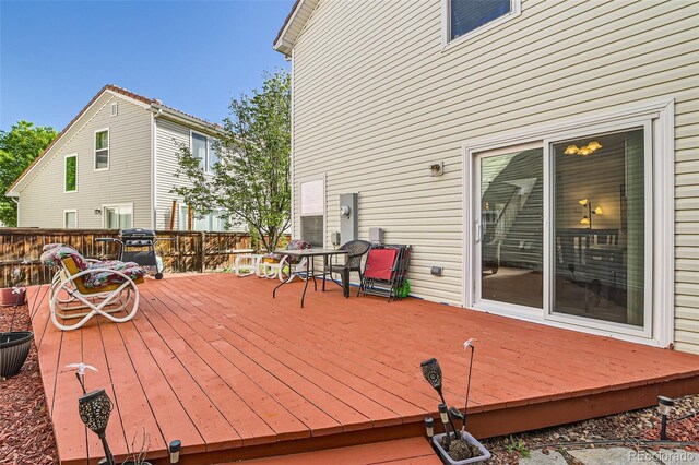 20000 Mitchell Pl Unit 51, Denver, CO 80249 - wooden deck with grilling area