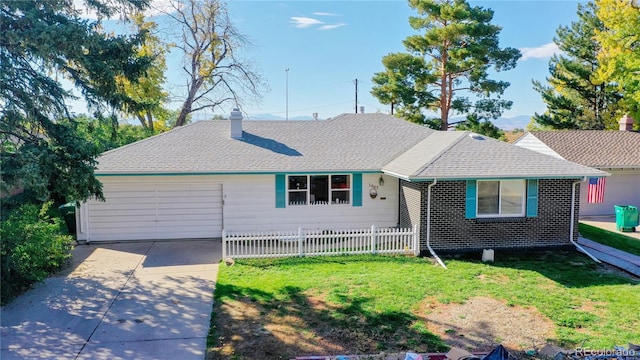 single story home with a garage and a front lawn