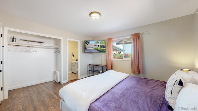 3067 S Holly Pl, Denver, CO 80222 - bedroom featuring wood finished floors, baseboards, and ensuite bath