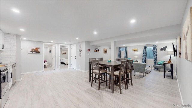 3067 S Holly Pl, Denver, CO 80222 - dining room with recessed lighting, baseboards, and light wood-style flooring