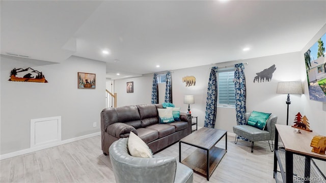 3067 S Holly Pl, Denver, CO 80222 - living area with recessed lighting, light wood-type flooring, stairs, and baseboards