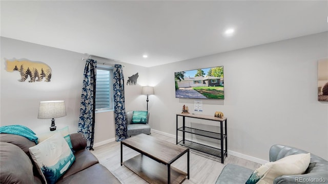 3067 S Holly Pl, Denver, CO 80222 - living area featuring light wood finished floors, baseboards, and recessed lighting