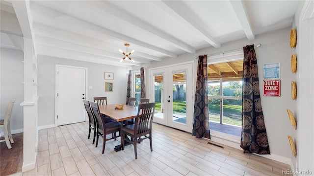 3067 S Holly Pl, Denver, CO 80222 - dining room featuring beamed ceiling, french doors, a chandelier, light wood-style flooring, and baseboards