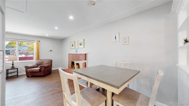 3067 S Holly Pl, Denver, CO 80222 - dining space with wood finished floors, recessed lighting, and a fireplace