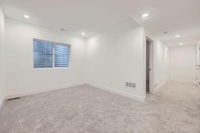 6926 Kendrick Ln, Arvada, CO 80007 - empty room featuring light colored carpet and recessed lighting