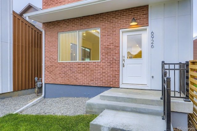 6926 Kendrick Ln, Arvada, CO 80007 - doorway to property with brick siding