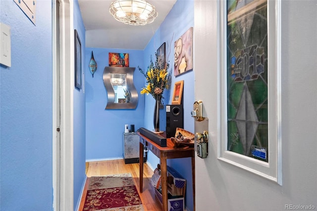 corridor featuring hardwood / wood-style floors