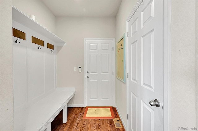 5722 S Flat Rock Way, Aurora, CO 80016 - mudroom with dark wood-type flooring and baseboards