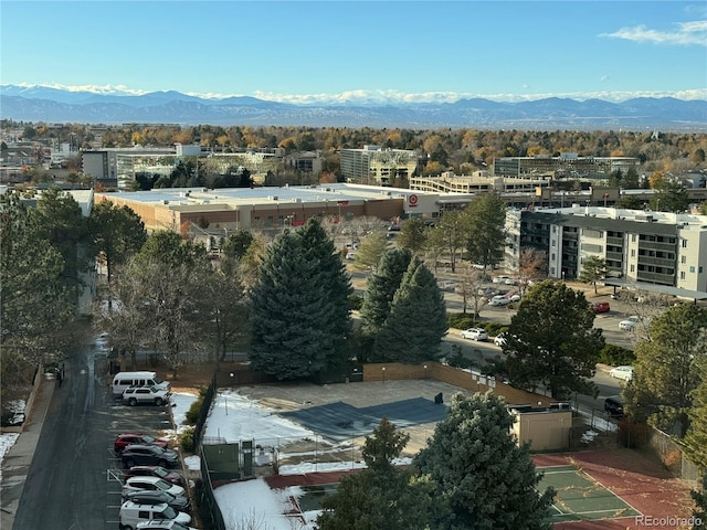 birds eye view of property featuring a mountain view