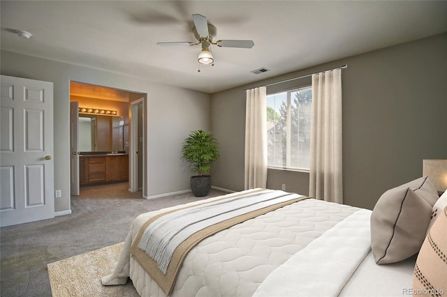 8416 S Reed St, Littleton, CO 80128 - bedroom with carpet, baseboards, ensuite bath, and a ceiling fan