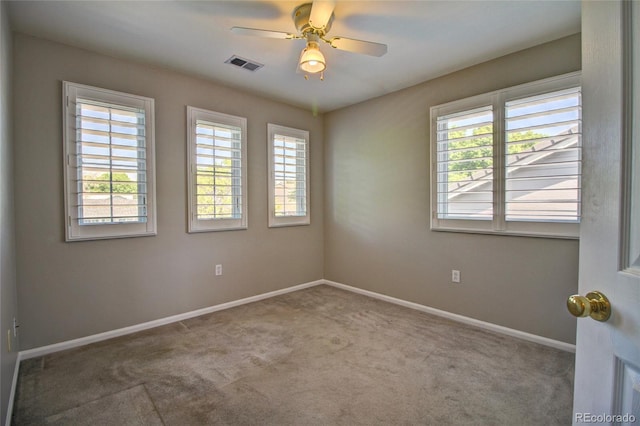 8416 S Reed St, Littleton, CO 80128 - empty room featuring healthy amount of natural light, carpet flooring, and baseboards