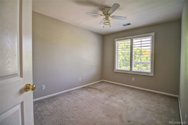 8416 S Reed St, Littleton, CO 80128 - carpeted spare room featuring baseboards and a ceiling fan