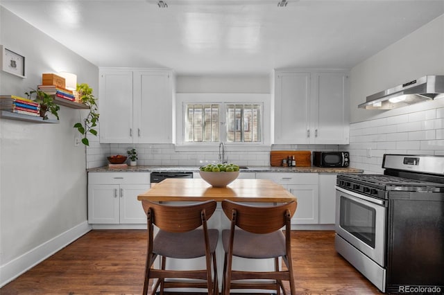 kitchen with white cabinetry, dark hardwood / wood-style floors, and black appliances