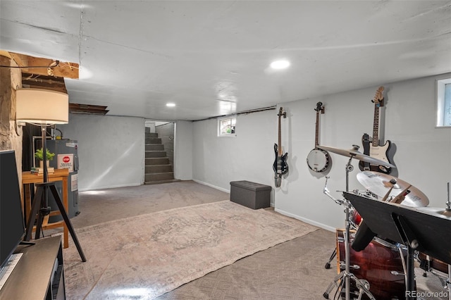 basement with light colored carpet and water heater