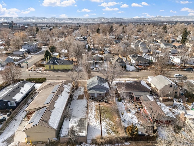 birds eye view of property featuring a mountain view