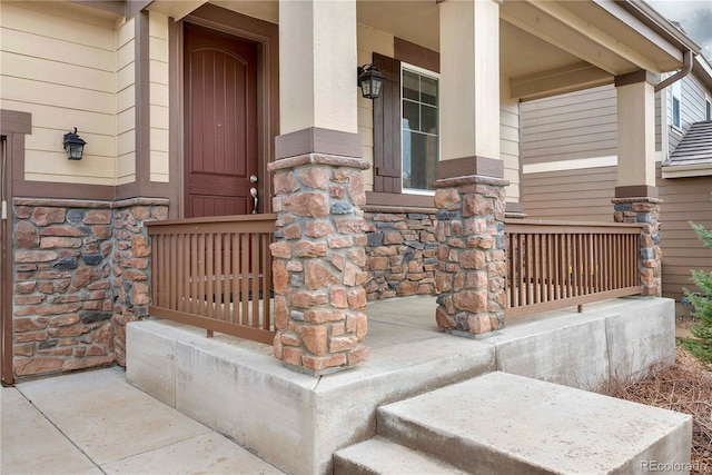 3522 Harvard Pl, Broomfield, CO 80023 - doorway to property with a porch and stone siding