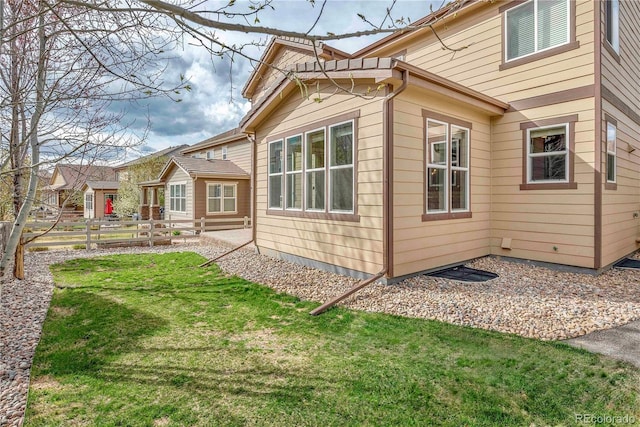3522 Harvard Pl, Broomfield, CO 80023 - rear view of property with fence and a yard