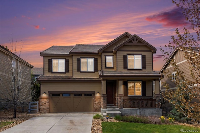 3522 Harvard Pl, Broomfield, CO 80023 - craftsman-style home featuring a porch, a garage, driveway, and stone siding