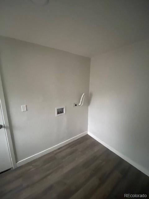 8220 E 104th Way, Henderson, CO 80640 - washroom with hookup for a washing machine, baseboards, and dark wood-type flooring