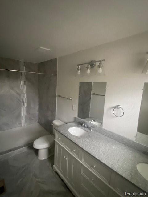 8220 E 104th Way, Henderson, CO 80640 - bathroom featuring double vanity, a shower, and toilet