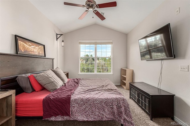 carpeted bedroom with vaulted ceiling and ceiling fan