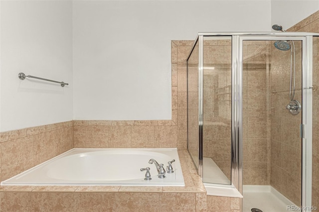 bathroom with independent shower and bath