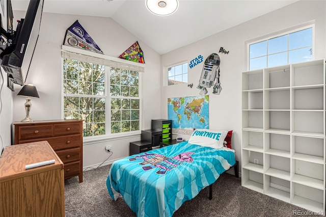 carpeted bedroom with lofted ceiling and multiple windows