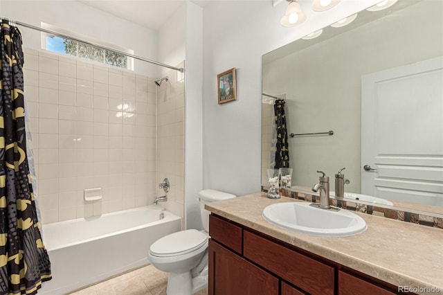 full bathroom featuring shower / bath combination with curtain, tile patterned floors, vanity, and toilet