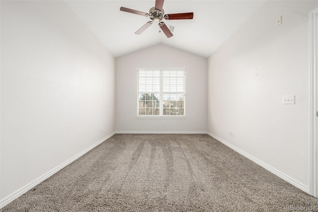 unfurnished room featuring ceiling fan, carpet flooring, and lofted ceiling