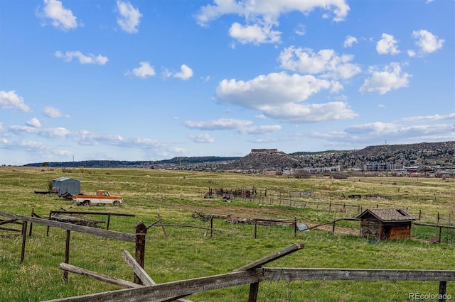 exterior space with a rural view