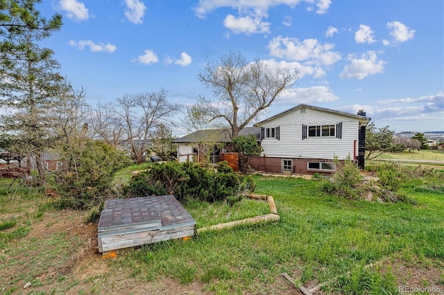 exterior space with a yard