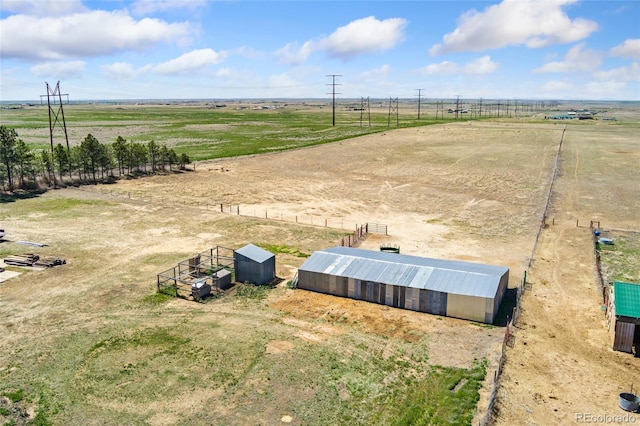 birds eye view of property featuring a rural view