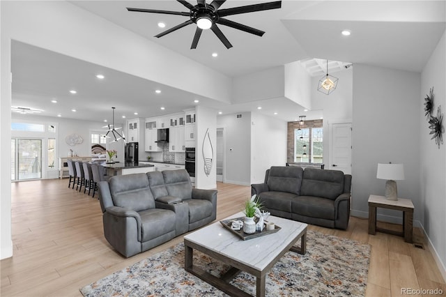 12215 Viewpoint Dr, Lakewood, CO 80401 - living room with light wood-type flooring, plenty of natural light, and a ceiling fan