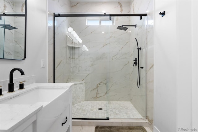 12215 Viewpoint Dr, Lakewood, CO 80401 - full bathroom featuring a marble finish shower and vanity