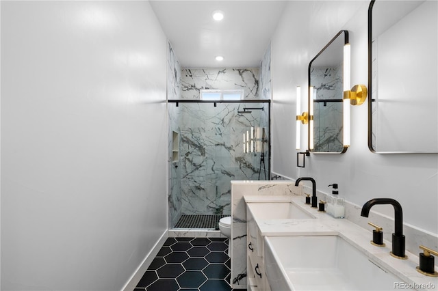 12215 Viewpoint Dr, Lakewood, CO 80401 - bathroom featuring a sink, a marble finish shower, toilet, and double vanity