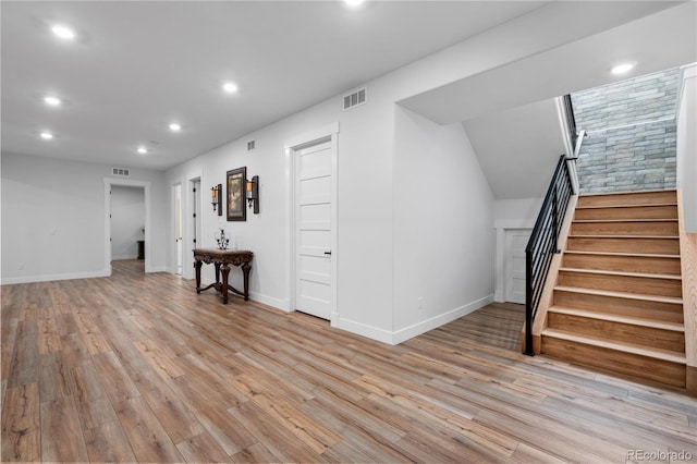 12215 Viewpoint Dr, Lakewood, CO 80401 - interior space with stairway, visible vents, baseboards, light wood-style flooring, and recessed lighting