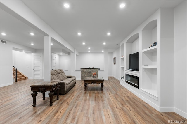 12215 Viewpoint Dr, Lakewood, CO 80401 - living area featuring recessed lighting, stairway, built in features, and light wood finished floors