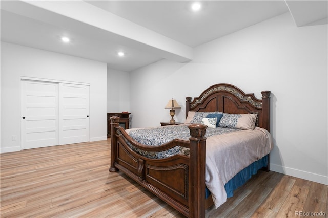 12215 Viewpoint Dr, Lakewood, CO 80401 - bedroom with recessed lighting, light wood-type flooring, baseboards, and a closet