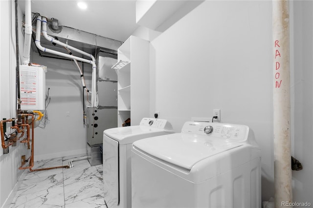 12215 Viewpoint Dr, Lakewood, CO 80401 - clothes washing area featuring washer and clothes dryer, laundry area, marble finish floor, and baseboards