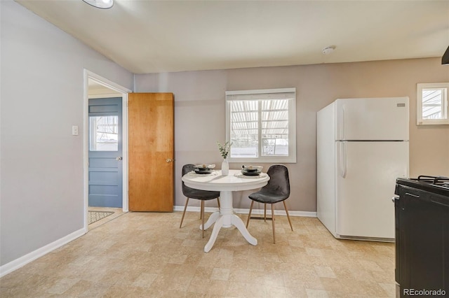 2601 Cooper Ave, Colorado Springs, CO 80907 - dining room featuring baseboards and light floors