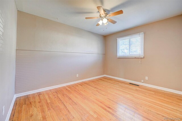 2601 Cooper Ave, Colorado Springs, CO 80907 - empty room with baseboards, wood finished floors, and a ceiling fan