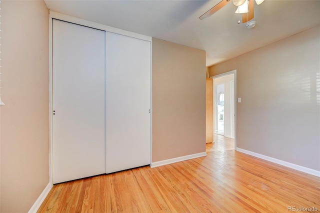 2601 Cooper Ave, Colorado Springs, CO 80907 - unfurnished bedroom with wood finished floors, baseboards, ceiling fan, and a closet