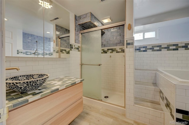 2601 Cooper Ave, Colorado Springs, CO 80907 - full bath featuring a shower stall and decorative backsplash