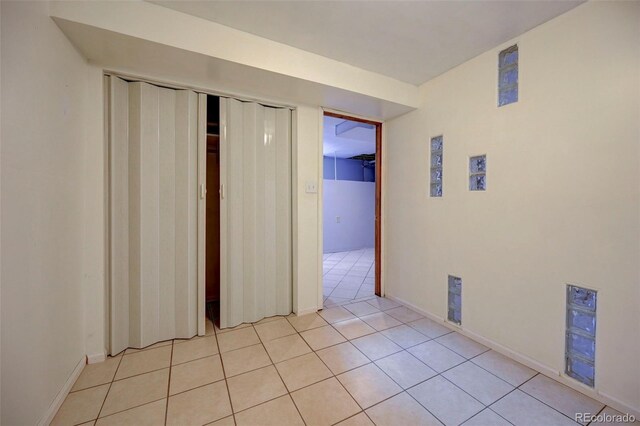 2601 Cooper Ave, Colorado Springs, CO 80907 - spare room with light tile patterned flooring and baseboards