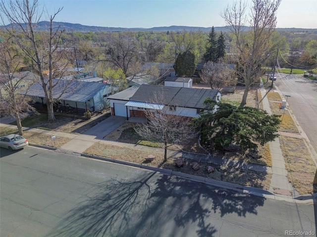 2601 Cooper Ave, Colorado Springs, CO 80907 - aerial view of property and surrounding area with a mountain backdrop