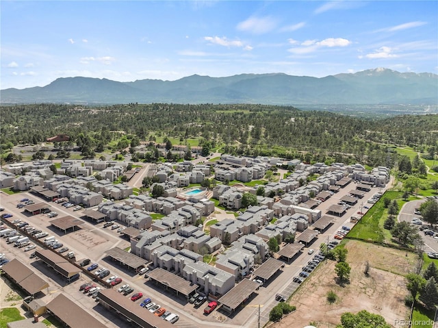 3110 Van Teylingen Dr Unit C, Colorado Springs, CO 80917 - view of property location with a mountain backdrop and a forest